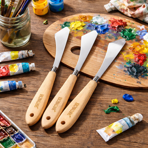 Wooden handled steel blade - handled,